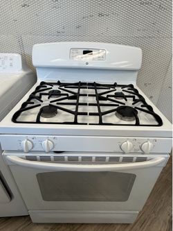 GE 4 burner gas stove