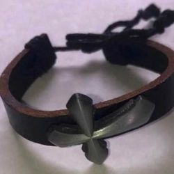 Black leather bracelet with cross