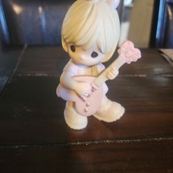 PRECIOUS MOMENTS FIGURINE 