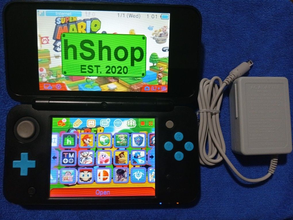 New Nintendo 2DS XL With Charger And Games Inside