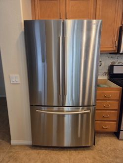 STAINLESS STEEL REFRIGERATOR,  RANGE, MICROWAVE AND DISHWASHER 