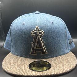 Los Angeles Angels 59FIFTY fitted hat by New Era features a blue denim crown and a tan heathered visor🔥