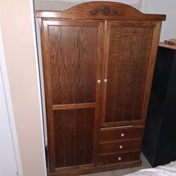 Vintage oak armoire wardrobe cabinet.