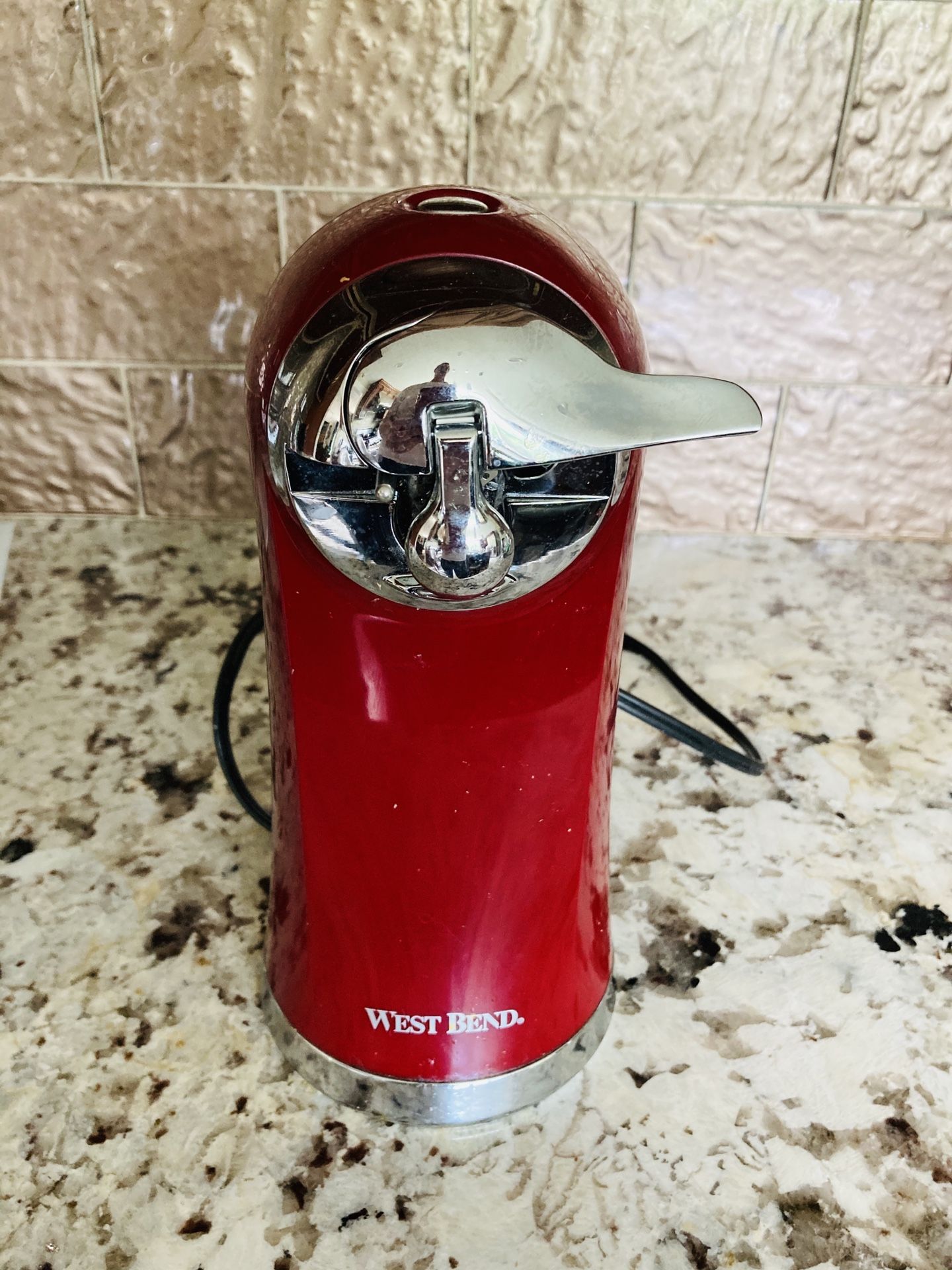 Red like New West Bend can opener electric