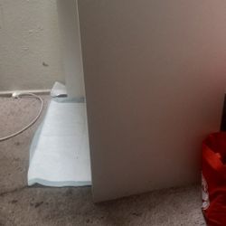 White Desk And Brown Couch
