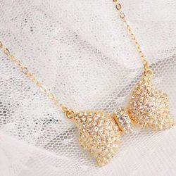 Crystal gold bow necklace with extender
