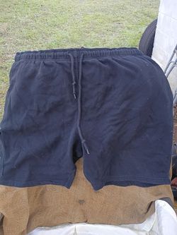 A Pair of Black XL CAT Shorts