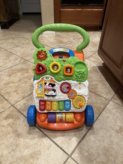 Walker with interactive play