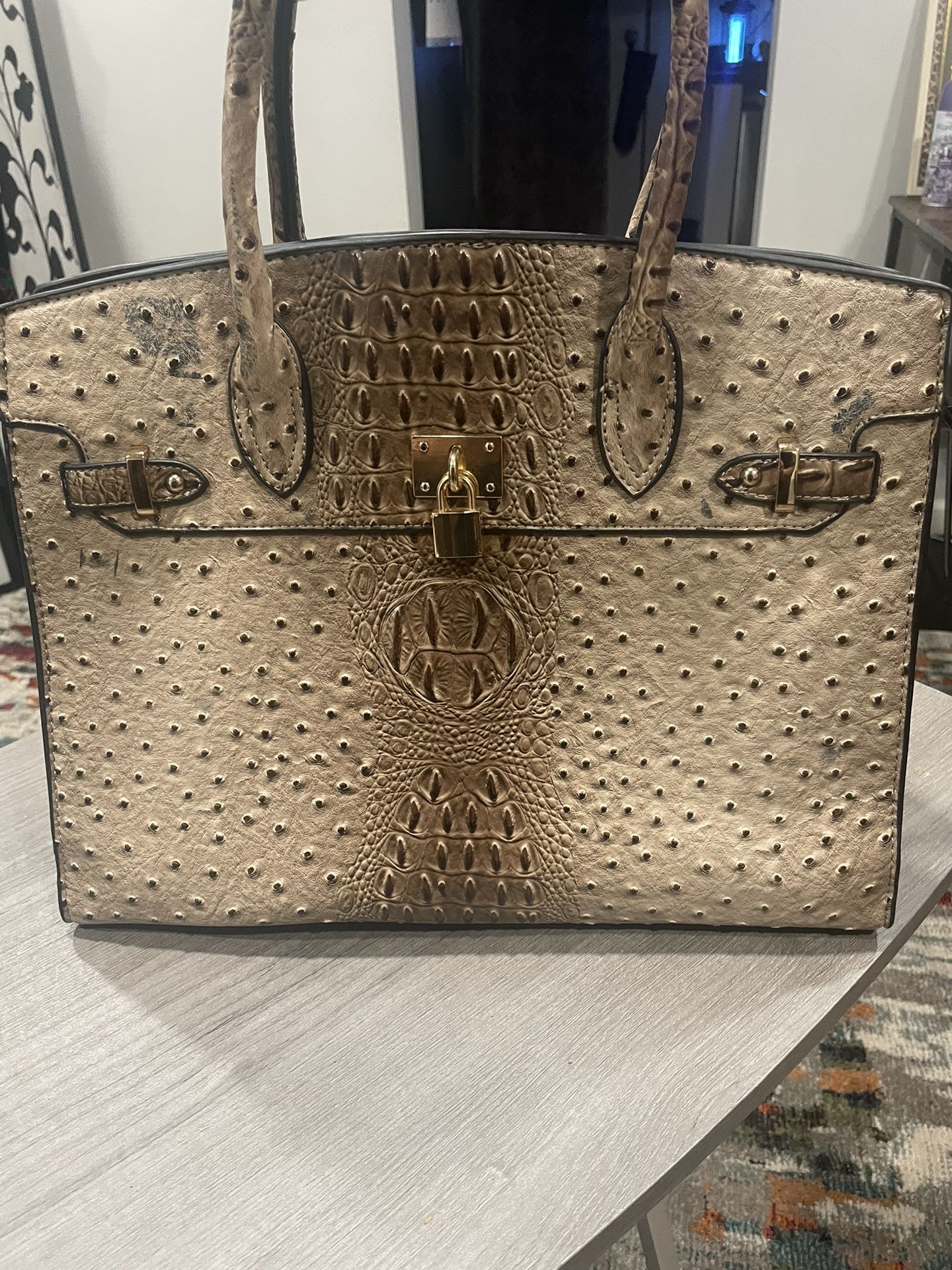 Beige and black purse