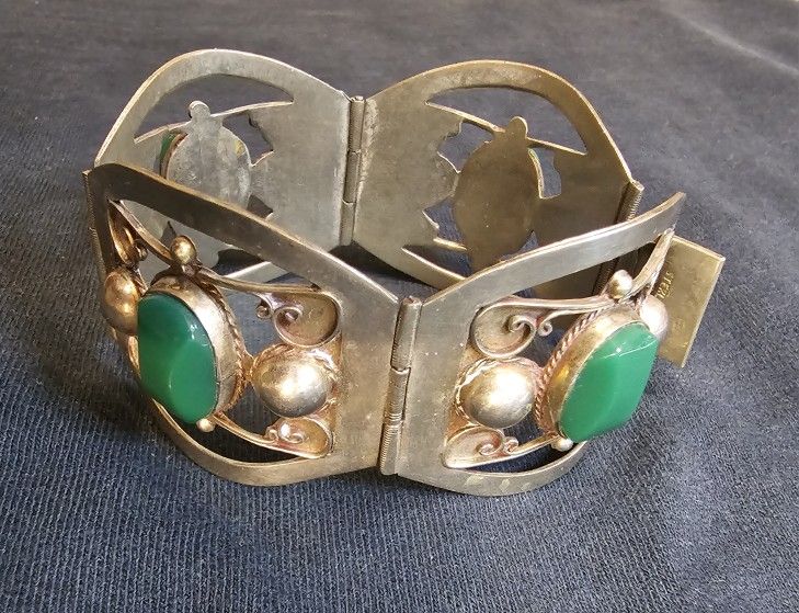 Sold. -------7 inch 925 Sterling Silver bracelet with 925 Sterling Silver earrings, over 52 grams Of Silver.