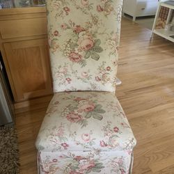 Custom Made Dining Chair with elegant roll back and a floor-length skirt 