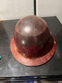 Fiber glass construction helmet