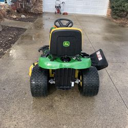 John Deer E140 Tractor 100 Series