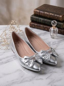 Silver ladies flats.