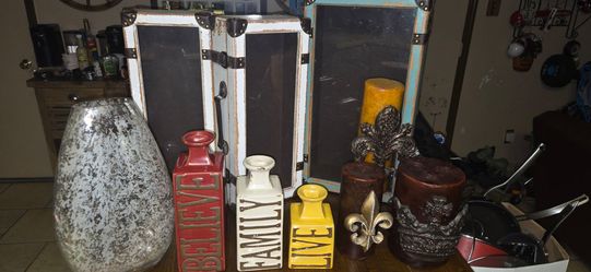 Hanging suitcases decor and vases