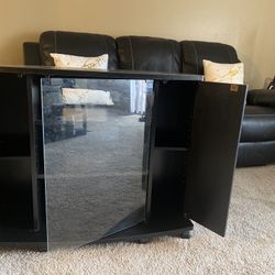Modern Black Glass-Front TV Stand – Sleek, Compact, and Functional
