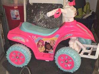 Barbie 4 wheeler electric car