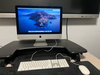 Apple iMac with Apple Keyboard and Apple Mouse