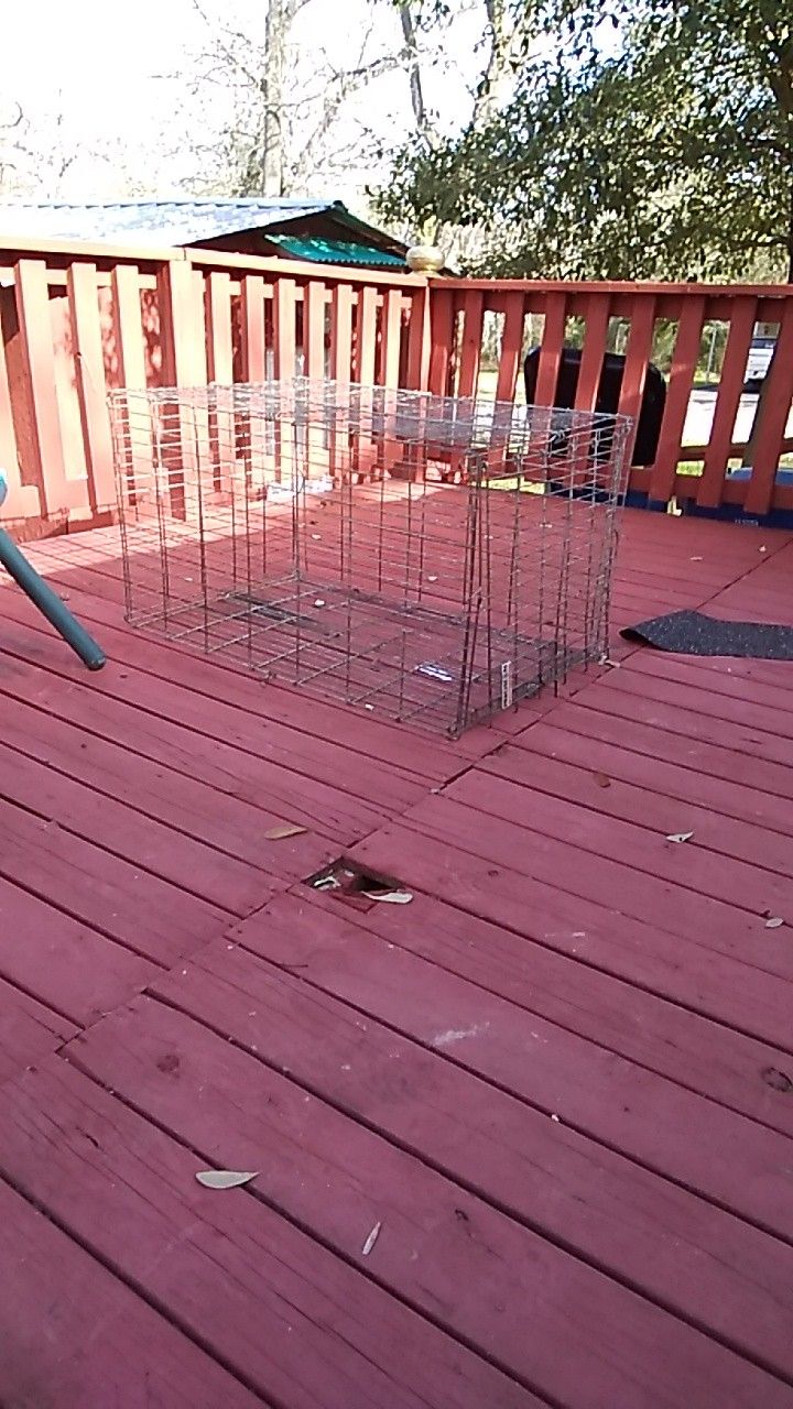 Large metal dog kennel with tray