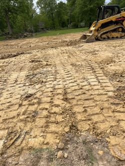 Skid Steer Material Spreading And Leveling
