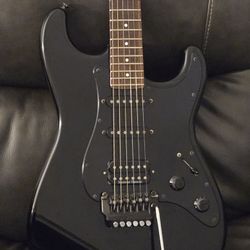 Collectible 1980s Japanese Made Fender Stratocaster Guitar (Black with rosewood fretboard)