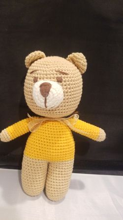 Hand knitted teddy bear