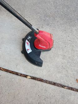 Homelite electric weed Wacker 13 inch with adjustable length on pole