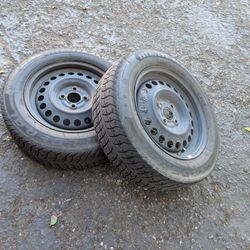 4x100  steelie wheels with used snow tires.