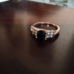 studded black gemstone ring