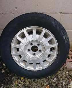 Brand new tire 205/65 r15 (never used with rim included)