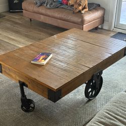 Rustic Cast Iron Swivel Wood Coffee Table
