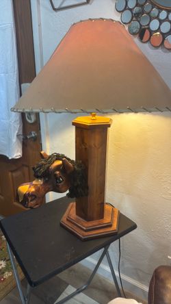 Horse lamp the lamp turns on when you push the head down