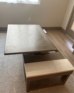 Ashley Loyaska/ Marble end/  lift top/ rolling wheels coffee table