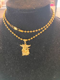 18 karat gold plated chain 27" long with 18 karat gold plated St Michael's