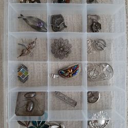 VARIOUS VINTAGE STERLING SILVER AND GOLD BRACELETS PENDANTS BROOCHES AND MORE.