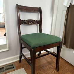 Antique wooden chair with new upholstery 