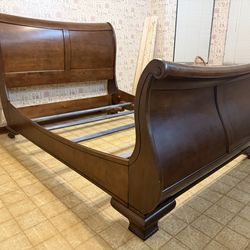 Gorgeous solid mahogany queen size scroll top sleigh bedframe! CAN DELIVER!!