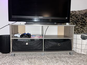 Gray TVStand With Black Bins ( Tv stand 19 inches tall 38 inches wide )