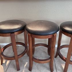 3 Swivel Bar Stools