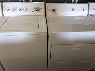 Used kenmore heavy duty washer and dryer set. 1 year warranty