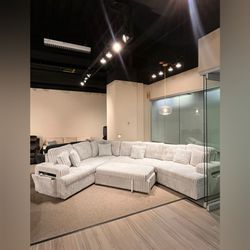 Large Cream Corduroy Sectional Sofa with pull out bed | new in boxes | delivery available