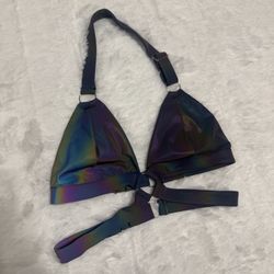 Light reflective top with adjustable straps. Reflective rainbow fabric Secure back closures offer a custom fit.  New L light reflective rainbow crop t