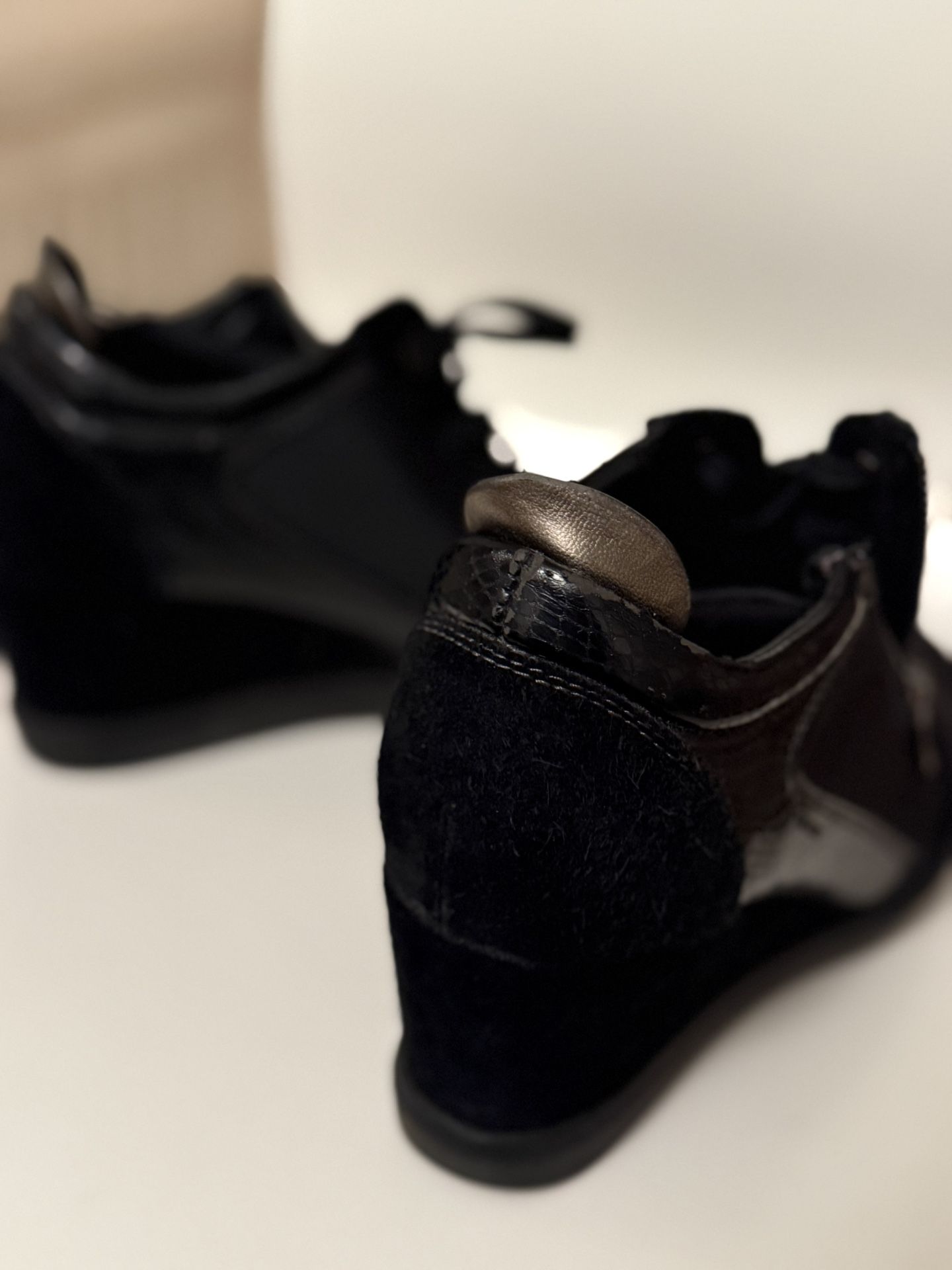 Black platform sneakers