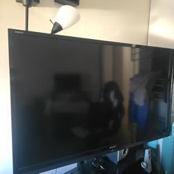 55 Inch TV With Stand 