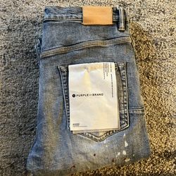 Purple Jeans:size 33w 33L light blue with paint splatter