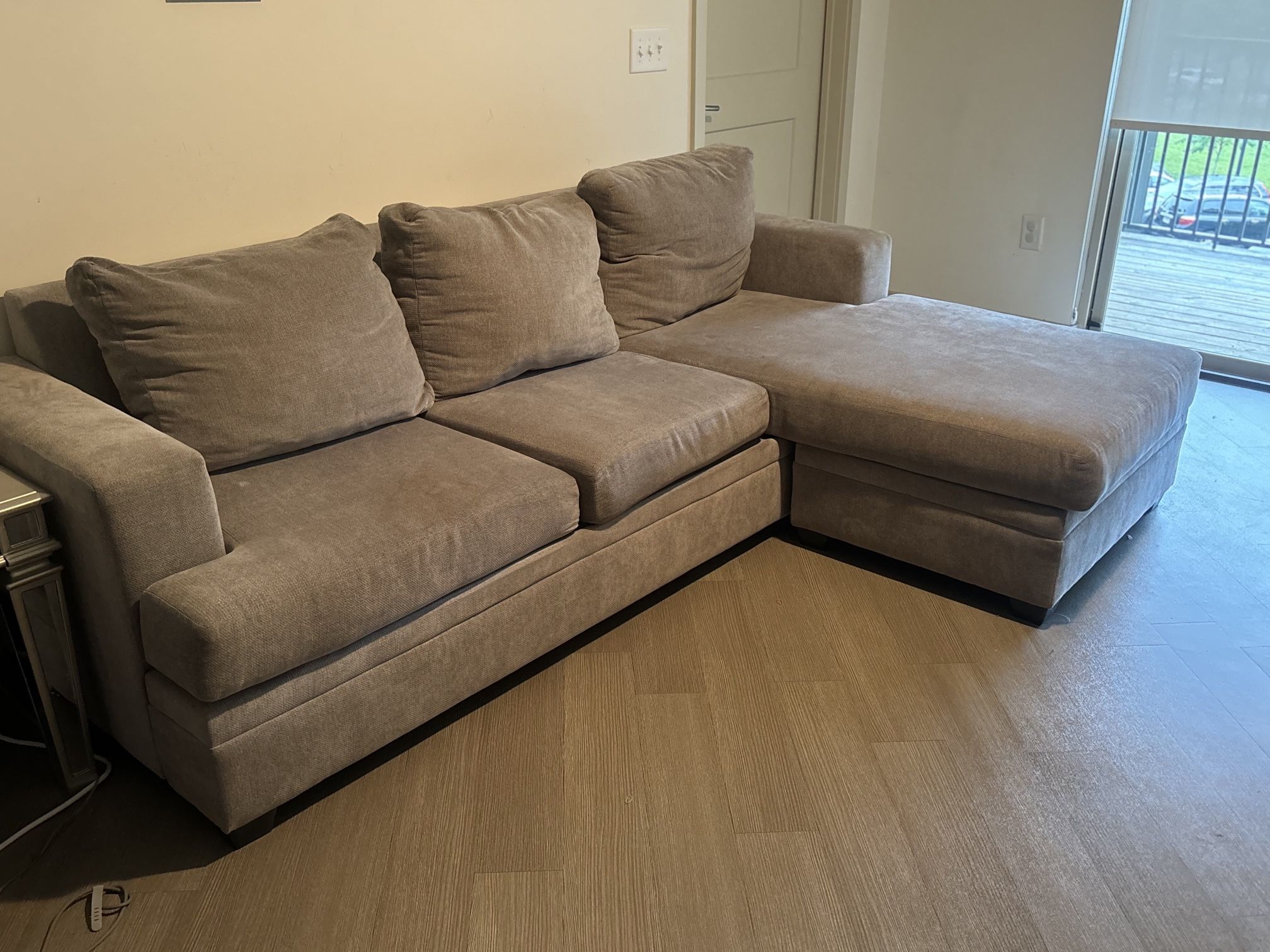 Living Spaces Gray Sectional Sofa – $400