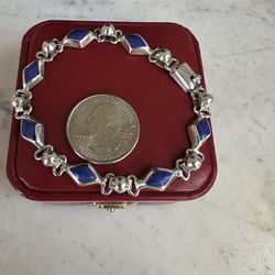 925 Sterling silver w/ diamond shaped blue lapis bracelet , size 7.25 , marked 925 Mexico 🇲🇽, slide lock closure . Beautiful