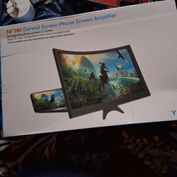  item shown is a 14" HD Curved Screen Phone Screen Magnifier, designed to enlarge smartphone displays for easier viewing. 