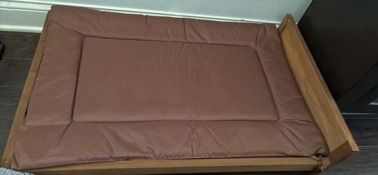 Wooden bed frame and mattress for dog