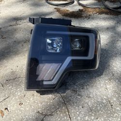DRIVER SIDE ONLY 2009-14 Ford F150 Headlight